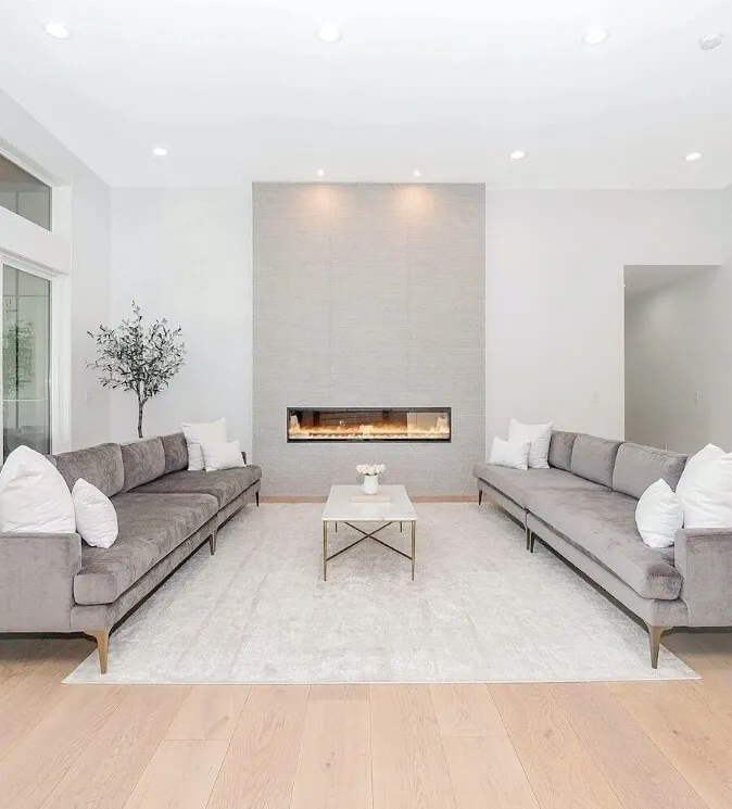 Luxury custom home living room with fireplace — built by Dornford Building Group in Adelaide
